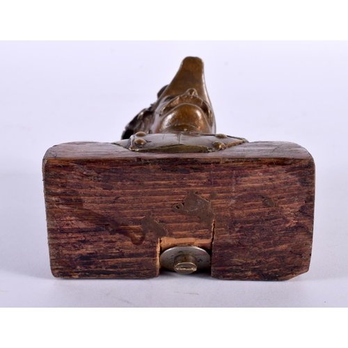 300 - A LATE 19TH CENTURY GRAND TOUR BRONZE BUST OF A MILITARY MALE modelled upon an oak plinth. 12 cm x 8... 