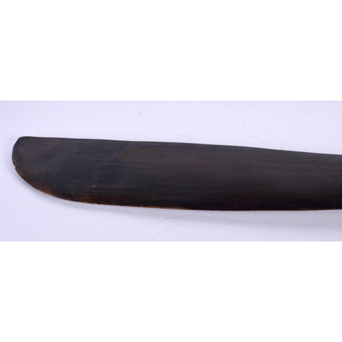 301 - A NATIVE AMERICAN CARVED WOOD CEREMONIAL PIPE together with an African ceremonial sword. Largest 93 ... 