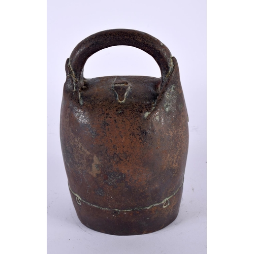 306 - AN ANTIQUE TIBETAN BRONZE BELL. 18cm x 8 cm.