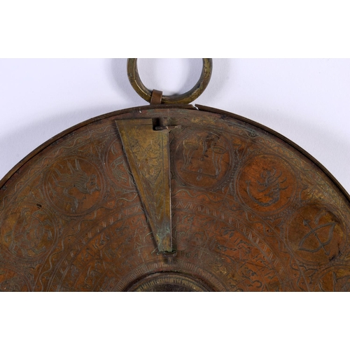 307 - A 19TH CENTURY MIDDLE EASTERN ISLAMIC COPPER ALLOY ASTROLABE decorated all over with animals, script... 