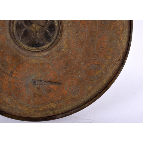 307 - A 19TH CENTURY MIDDLE EASTERN ISLAMIC COPPER ALLOY ASTROLABE decorated all over with animals, script... 