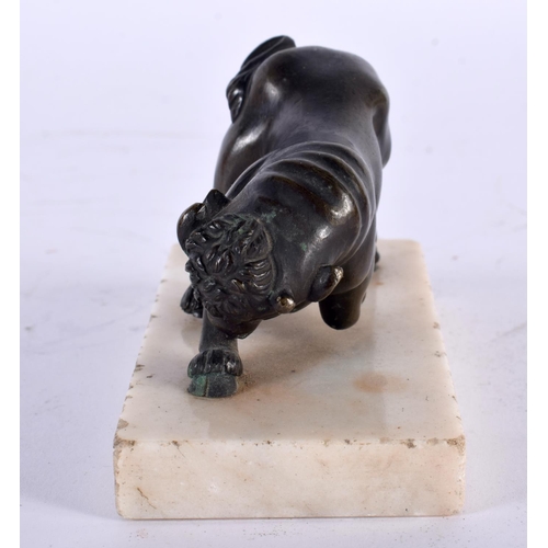 309 - A 19TH CENTURY EUROPEAN GRAND TOUR BRONZE FIGURE OF A BULL modelled upon a marble base. 10 cm x 7cm.