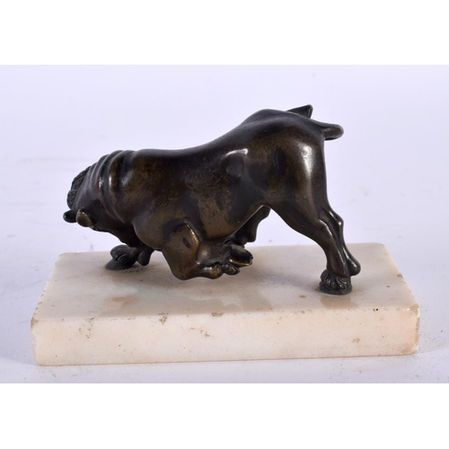 309 - A 19TH CENTURY EUROPEAN GRAND TOUR BRONZE FIGURE OF A BULL modelled upon a marble base. 10 cm x 7cm.