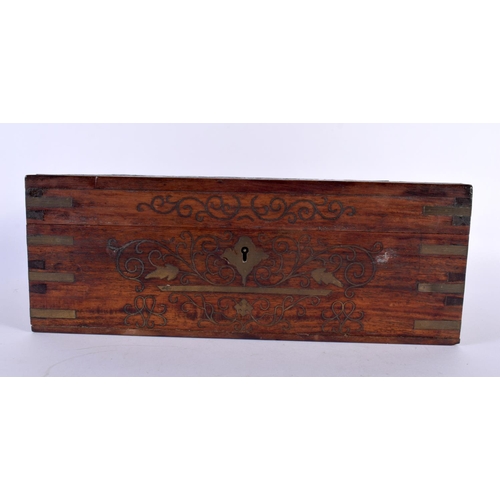 310 - AN ANGLO INDIAN ROSEWOOD BRASS INLAID JEWELLERY BOX decorated with foliage and vines. 30cm x 20cm.