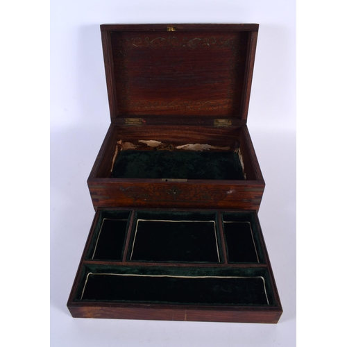 310 - AN ANGLO INDIAN ROSEWOOD BRASS INLAID JEWELLERY BOX decorated with foliage and vines. 30cm x 20cm.