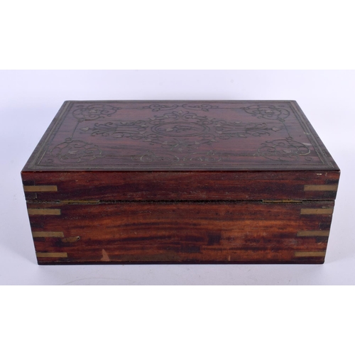 310 - AN ANGLO INDIAN ROSEWOOD BRASS INLAID JEWELLERY BOX decorated with foliage and vines. 30cm x 20cm.