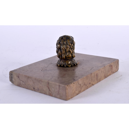 311 - AN 18TH CENTURY ENGLISH BRONZE AND MARBLE DESK STAND PAPERWEIGHT formed as a lion mask head. 13 cm x... 