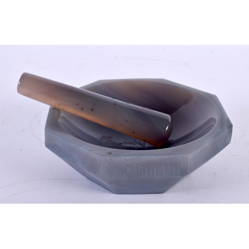 314 - AN ART DECO CONTINENTAL AGATE PESTLE AND MORTAR. 11cm wide. (2)