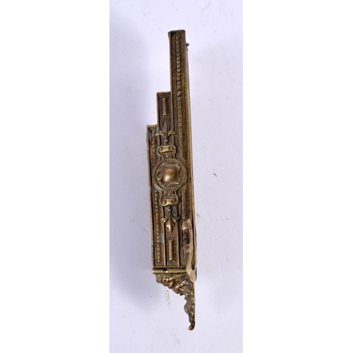 317 - A 19TH CENTURY FRENCH BRONZE FAN HOLDER decorated with mask heads. 19 cm long.