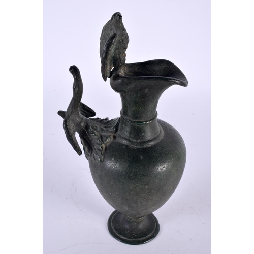 324 - A 19TH CENTURY EUROPEAN GRAND TOUR BRONZE EWER After the Antiquity, with bird mounts to handle and r... 