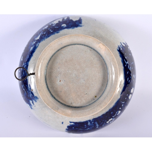 33 - AN EARLY 19TH CENTURY ENGLISH FLOW BLUE PEARLWARE BOWL painted with landscapes. 22cm diameter.