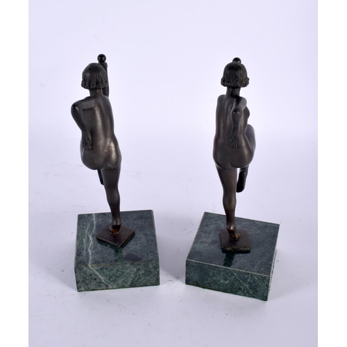 331 - A PAIR OF ART DECO BRONZE FIGURES OF DANCERS modelled upon marble plinths. 21 cm high.