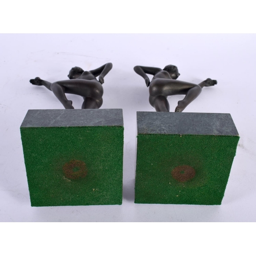 331 - A PAIR OF ART DECO BRONZE FIGURES OF DANCERS modelled upon marble plinths. 21 cm high.