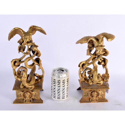 332 - A RARE PAIR OF EARLY 19TH CENTURY EUROPEAN ORMOLU FIGURAL GROUPS depicting vultures overlooking rear... 