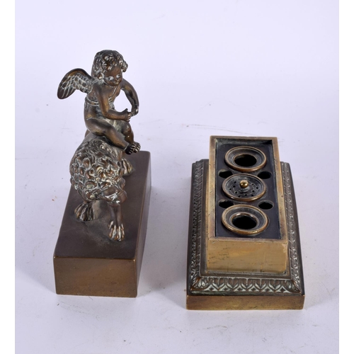 335 - A LOVELY EARLY 19TH CENTURY ENGLISH REGENCY BRONZE INKWELL depicting a winged boy riding upon a lion... 