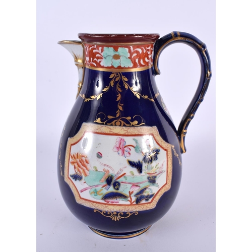 34 - A RARE ANTIQUE MASONS IRONSTONE HOT WATER JUG printed and painted with flowers upon a rich blue grou... 