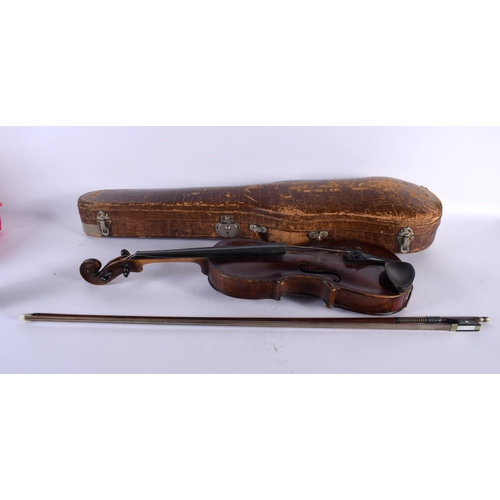 343 - A CASED SINGLE PIECE BACK VIOLIN together with a bow. Violin 57 cm long, length of back 35.5 cm. (2)