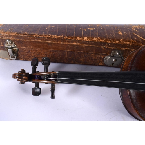 343 - A CASED SINGLE PIECE BACK VIOLIN together with a bow. Violin 57 cm long, length of back 35.5 cm. (2)