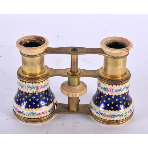 345 - A PAIR OF ANTIQUE J H STEWARD ENAMEL OPERA GLASSES painted with flowers and star shaped motifs. 7cm ... 