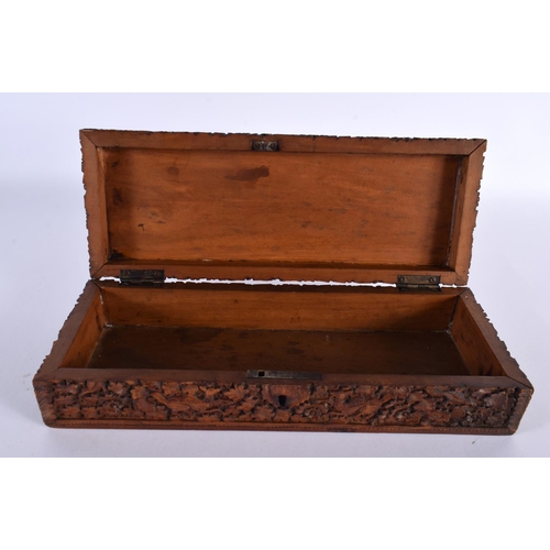 352 - A FINE 19TH CENTURY INDIAN CARVED SANDALWOOD RECTANGULAR CASKET decorated all over with animals in e... 