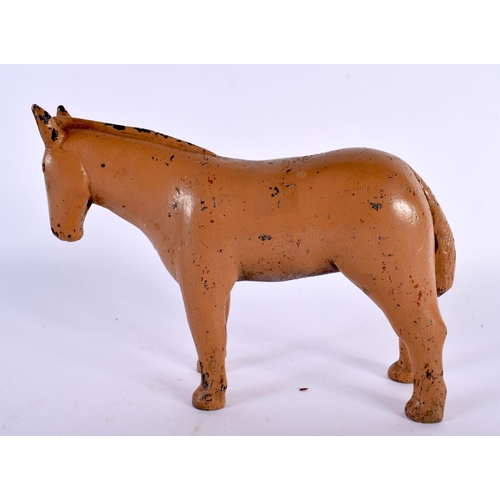 353 - A VINTAGE CARVED FOLK ART PAINTED NAIVE FIGURE OF A HORSE. 27 cm x 14cm.