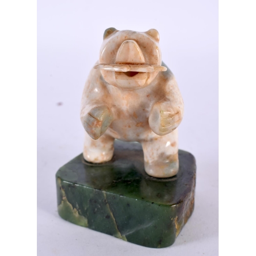 360 - A VINTAGE NORTH AMERICAN CARVED JADE AND STONE FIGURE OF A POLAR BEAR modelled with a fish within it... 