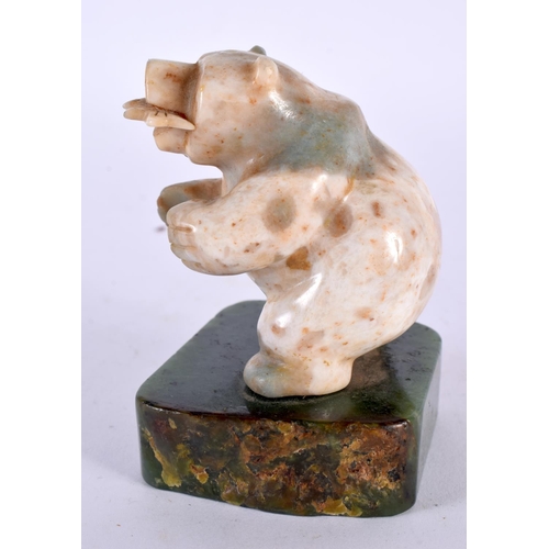 360 - A VINTAGE NORTH AMERICAN CARVED JADE AND STONE FIGURE OF A POLAR BEAR modelled with a fish within it... 