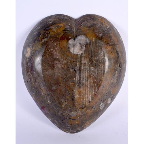 361 - AN UNUSUAL FOSSILISED AMMONITE STONE HEART FORM COUNTRY HOUSE DISH. 20cm x 15cm.