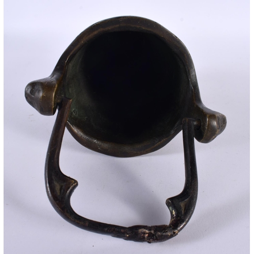 363 - AN UNUSUAL ANTIQUE CONTINENTAL BRONZE SWING HANDLED MEASURING BUCKET decorated in relief with eccles... 