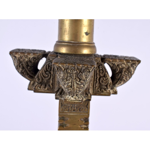 365 - AN UNUSUAL 19TH CENTURY COUNTRY HOUSE BRONZE CANDLESTICK LAMP decorated all over with geometric moti... 