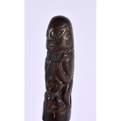 369 - A 19TH CENTURY MIDDLE EASTERN ASIAN CARVED RHINOCEROS HORN DAGGER formed with tribal figures. 28cm l... 