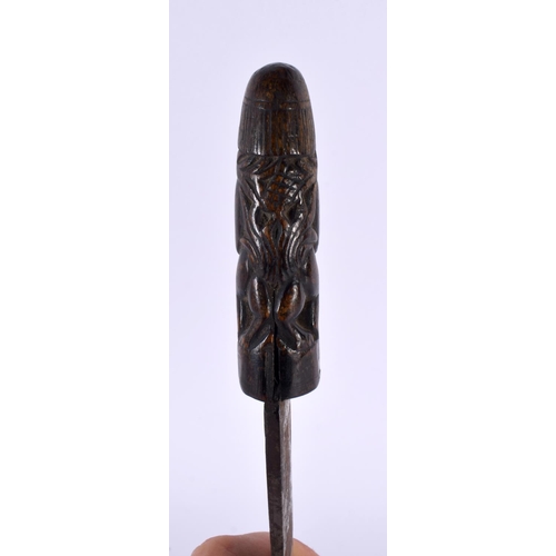 369 - A 19TH CENTURY MIDDLE EASTERN ASIAN CARVED RHINOCEROS HORN DAGGER formed with tribal figures. 28cm l... 