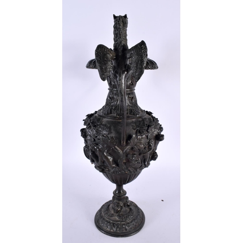 373 - A LARGE 19TH CENTURY TWIN HANDLED BRONZE GRAND TOUR VASE decorated in relief with figures, the handl... 