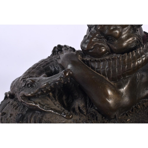 378 - A FRENCH BRONZE AND MARBLE STUDY OF A LEOPARD modelled attacking a crocodile, upon a red marble base... 