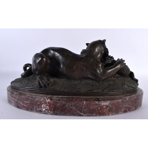 378 - A FRENCH BRONZE AND MARBLE STUDY OF A LEOPARD modelled attacking a crocodile, upon a red marble base... 