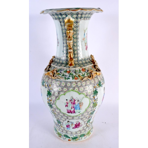 394 - A LARGE 19TH CENTURY CHINESE CANTON FAMILLE ROSE PORCELAIN VASE Qing, painted with figures in landsc... 