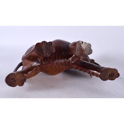 395 - THREE 19TH CENTURY CHINESE CARVED HARDWOOD WOOLLY MAMMOTH ELEPHANTS Qing. Largest 27 cm x 22cm. (3)