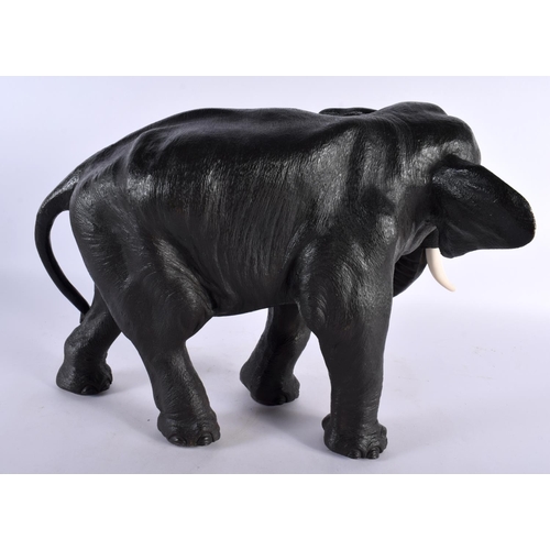 397 - A LARGE 19TH CENTURY JAPANESE MEIJI PERIOD BRONZE OKIMONO of an elephant, modelled in a roaming stan... 