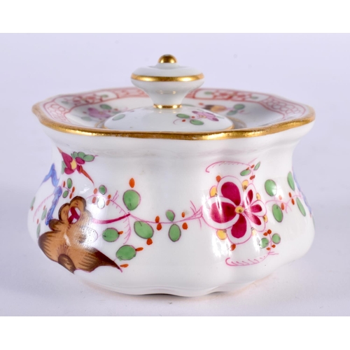 4 - A MEISSEN PORCELAIN INKWELL AND COVER painted with flowers and vines. 7.5 cm wide.