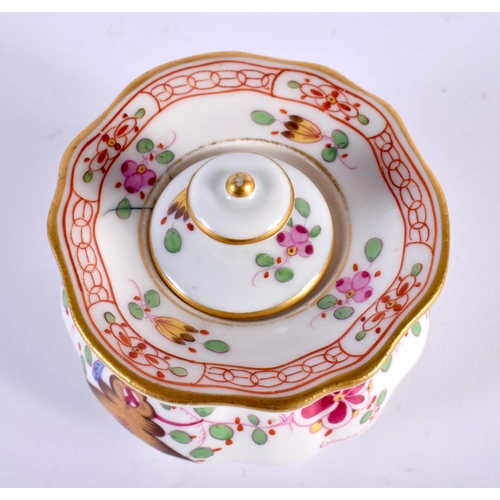 4 - A MEISSEN PORCELAIN INKWELL AND COVER painted with flowers and vines. 7.5 cm wide.