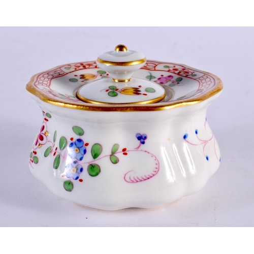 4 - A MEISSEN PORCELAIN INKWELL AND COVER painted with flowers and vines. 7.5 cm wide.