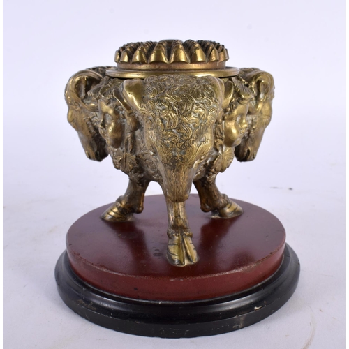 402 - A FINE 19TH CENTURY EUROPEAN GRAND TOUR BRONZE INKWELL AND COVER upon a red marble base, formed with... 