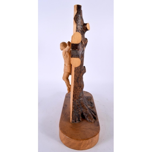 409 - AN UNUSUAL CONTEMPORARY CARVED BURR WALNUT CRUCIFIX signed and numbered. 30cm x 22cm.