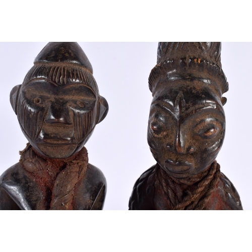 412 - TWO AFRICAN TRIBAL CARVED WOOD FIGURES. Largest 28cm high. (2)