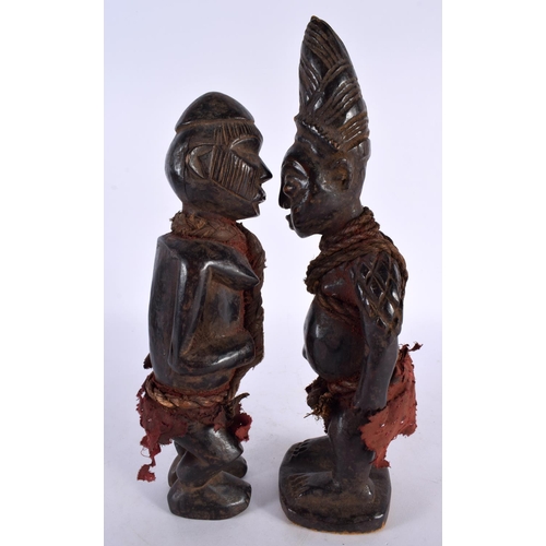 412 - TWO AFRICAN TRIBAL CARVED WOOD FIGURES. Largest 28cm high. (2)