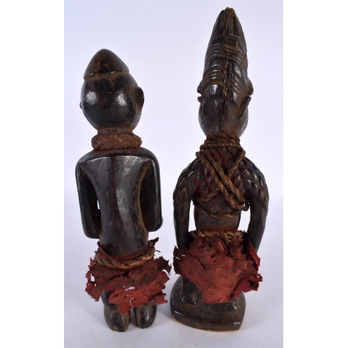 412 - TWO AFRICAN TRIBAL CARVED WOOD FIGURES. Largest 28cm high. (2)