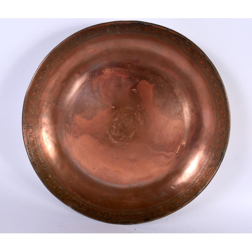 414 - THREE EARLY MIDDLE EASTERN TINNED COPPER ALLOY DISHES in various forms and sizes. Largest 26 cm diam... 