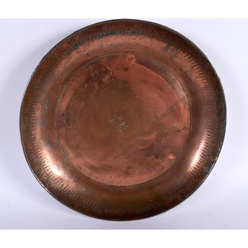 414 - THREE EARLY MIDDLE EASTERN TINNED COPPER ALLOY DISHES in various forms and sizes. Largest 26 cm diam... 