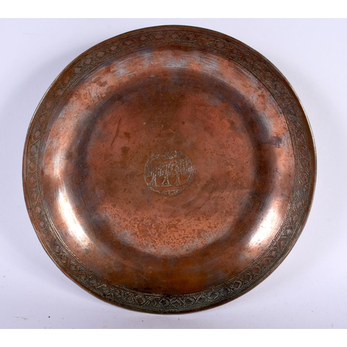 414 - THREE EARLY MIDDLE EASTERN TINNED COPPER ALLOY DISHES in various forms and sizes. Largest 26 cm diam... 