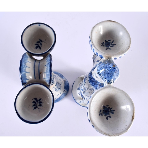 42 - AN ANTIQUE DELFT BLUE AND WHITE TIN GLAZED POTTERY DOUBLE TABLE SALT together with another similar f... 